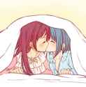 kissing under a blanket