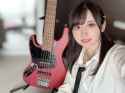 meishan-with-her-newly-purchased-bass-guitar-v0-tmvv1hkyw51f1