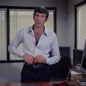 leonard_nimoy_standing_leaning_against_desk_1960s_office_room_full_body_partly_unbuttoned_shirt_put_betsvyu5twifqvnmpwx5_3