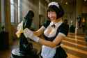 Maid Polishes Obsidian Sculpture