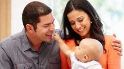 couple_at_home_with_baby_1200x675