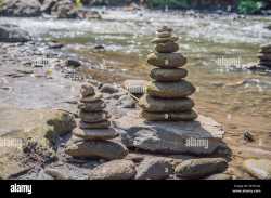 inuksuk-native-rock-pile-in-a-creek-W33CAA