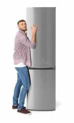 young-man-hugging-closed-refrigerator-white-background-134344136-1460319246