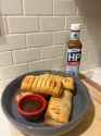 hp sauce with sausage rolls