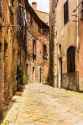 depositphotos_106086730-stock-photo-street-of-the-medieval-village