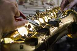 saxophone-repair-credit-Westend61-via-Getty-Images