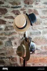 a-hat-rack-with-vintage-hats-at-at-the-hopper-goetschius-house-museum-KGR0J2[1]