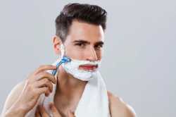 photo-handsome-man-shaving-his-260nw-193367936