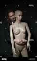 man-posing-with-a-female-mannequin-dummy-hugging-her-waist-from-behind-DXPY60