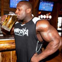 muscle man drinking beer