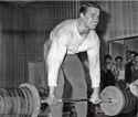 arnold-schwarzenegger-deadlifting-with-barbell