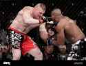 ufc-fighters-brock-lesnar-left-and-alistair-overeem-fight-at-ufc-141-HBGEWX-1280384328.jpg