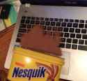 nesquik powder on laptop keyboard