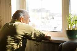 lonely-old-man-staring-out-window-age-home-as-longs-his-freedom-friends-37466365_jpg