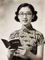 jimeng-2025-05-01-984-Historical photograph, 1960&#039;s black and white photo, holding book 毛主席语录, glas...
