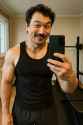 20250709_0651_Gym Selfie Transformation_remix_01jzqcwzxsfyrt82gtbkxkayx3
