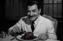 20250710_1014_Noir Doctor&#039;s Cake_simple_compose_01jztawfecfk2ba8hfx9bt18xm