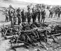 US generals Eisenhower, Bradley, Patton, and Eddy inspect a cremation pyre at Ohrdruf concentration camp on April 12, 1945