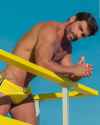 HUNK in yellow Speedo