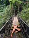 lye unconscious on rope bridge