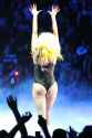 Lady-Gaga-Rear-View-Butt-Layered-Cake-Leotard-Fishnets-Arms-Raised-Blonde-Italian-American-Celebrity-Singer-06649_TacomaConcertAug22201032_122_590lo