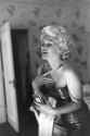 Marilyn Monroe gets ready to go see the play Cat On A Hot Tin Roof