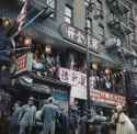 Spectators on a balcony in Chinatown, Manhattan, during Chinese New Year celebrations New York City, 28th January 1960.