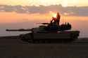 US_Navy_050225-M-5882G-080_U.S._Marines,_assigned_to_1st_Platoon,_Alpha_Company,_2nd_Tank_Battalion,_provide_security_with_an_M1A1_Abrams_main_battle_tank_along_the_Iraqi-Syrian_border,_south_of_Husaybuh,_Iraq