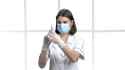 nurse getting ready to inject OP