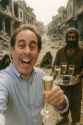 20250514_1427_Cheerful Toast Amid Ruins_simple_compose_01jv80pwt6eseb8ed2nf43ypp4