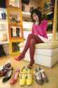 Asian-Sitting-Wool-Tights-Feet-Shoes-Heels-Looking-Diagonally-Down-82560644