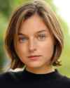 5540ea8e-65f7-46c9-ab58-f95ef203816d-Emma_Corrin_Headshot