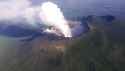 An_aerial_view_of_the_towering_volcanic_peak_of_Mt._Nyiragongo