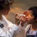 examining eyes