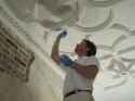 plasterer working on cieling