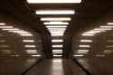 fluorescent lamps in long hallway