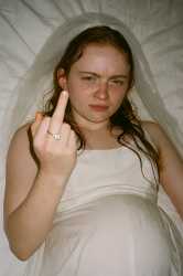 20250716_1119_Pregnant Bride Selfie_simple_compose_01k09x03mmfwytpny8kwm0mhbj