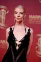 Anya Taylor-Joy pairs leather bralette with sheer dress at Marra.jpg