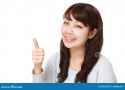 young-japanese-woman-thumbs-up-gesture-studio-shot-white-background-62283252