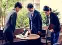 Japanese business people slightly bowing