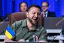 ukrainian-president-volodymyr-zelensky-laughs-he-attends-1500w-14007818c.jpg