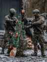 Polish soldiers decorate christmas tree on Belarus border