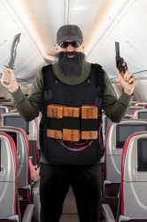 armed-terrorist-threatens-flying-plane-600nw-461984905