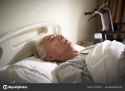 depositphotos_340455236-stock-photo-sick-old-man-lying-in