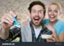 stock-photo-young-couple-feeding-baby-by-spoon-photographed-from-baby-s-point-of-view-focus-on-spoon-485555557