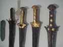 Mycenaean-swords-with-elaborate-gold-plating-1400-1300-BC-From-left-small-dagger-with