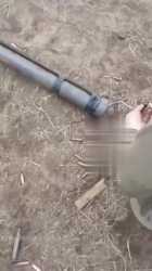 russian_soldier_fires_an_improvised_portable-launcher