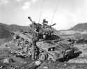 M46_Patton_Tank_Providing_Indirect_Fire_in_Korea_(127-GK-233E-A159450)