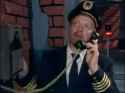 the pilot in a local pub after the accident calling his wife how he can&#039;t make it for the stupid cat&#039;s christening