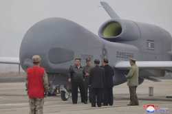 kim-jong-un-standing-drone
